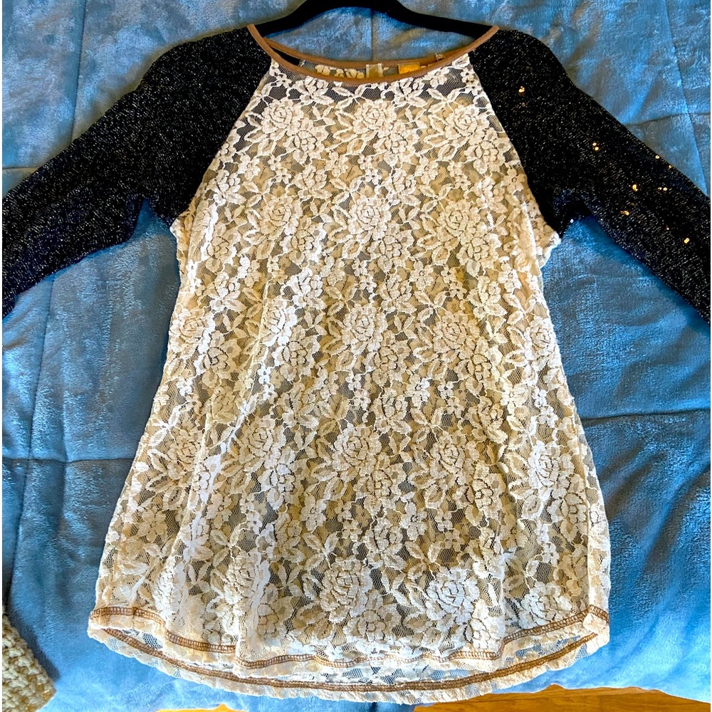 Beautiful see through lace BKE top. Casual but sexy. Worn once.